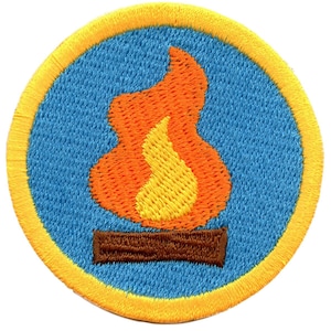 May include: A round, yellow-bordered patch with a blue background. A stylized orange and yellow flame is depicted on a brown log.