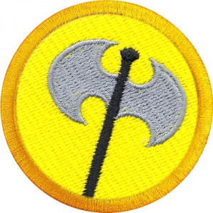 May include: A yellow embroidered patch with an orange border. The patch features a black double-headed axe with silver blades.
