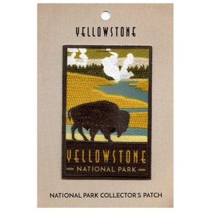 May include: Yellowstone National Park collector's patch featuring an embroidered image of a bison, a river, and a geyser. The patch is brown, green, and yellow.