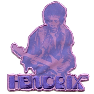 May include: Purple embroidered patch featuring a silhouette of Jimi Hendrix playing a guitar with the text "Hendrix" in purple below.