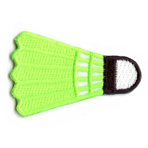 May include: A green and white badminton shuttlecock with a brown cork base. The shuttlecock is embroidered with white stitching.