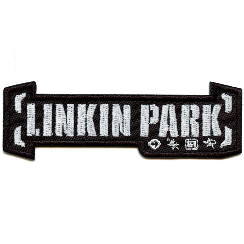 May include: Black and white embroidered patch with the text "LINKIN PARK" in a white font on a black background. The patch is shaped like a street sign with arrows on either side. There are small symbols on the bottom right corner of the patch.