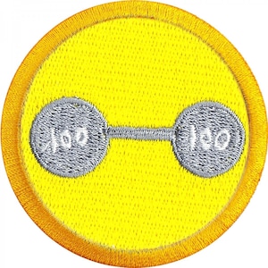 May include: Yellow round embroidered patch with an orange border. The patch features a gray barbell with the numbers 100 on each side.