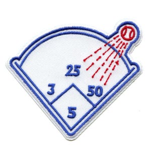 May include: White baseball field patch with blue stitching and red stitching. The patch shows a baseball being hit out of the park. The numbers 3, 5, 25, and 50 are on the patch.
