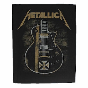May include: Black and gold embroidered patch featuring a guitar with the text "Metallica" above it.