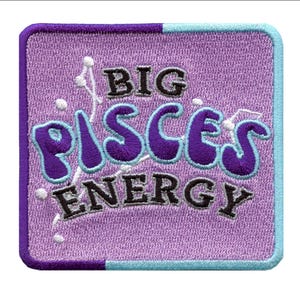 May include: Purple and blue embroidered patch with the text "BIG PISCES ENERGY" on a light purple background.