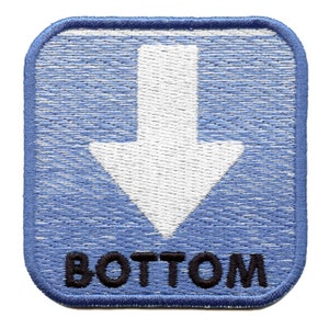 May include: Blue and white embroidered patch with a white arrow pointing down and the word "BOTTOM" in black lettering.