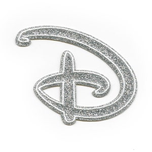 May include: Silver glitter iron-on patch in the shape of the Disney logo letter "D".