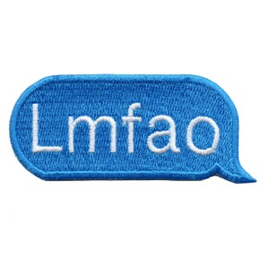 May include: An iron-on patch embroidered in blue and white with the text "Lmfao" in a speech bubble shape.