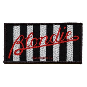 May include: Black and white striped fabric patch with the word "Blondie" in red cursive lettering. The patch has a black border and a copyright notice at the bottom.