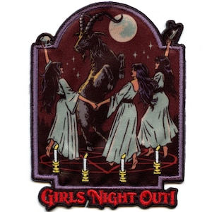 May include: An embroidered patch with a dark purple border and a red pentagram with three women in white dresses dancing around a black goat with horns. The text "Girls Night Out!" is in red at the bottom of the patch.