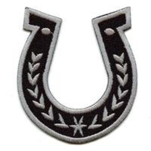 May include: Black horseshoe patch with a white star and a white laurel wreath design.