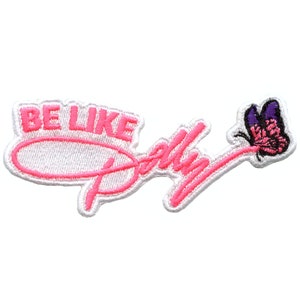 May include: Pink embroidered patch with the text "BE LIKE DOLLY" and a pink and purple butterfly.