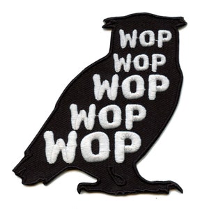 May include: Black embroidered patch shaped like an owl with the word "WOP" repeated five times in white.