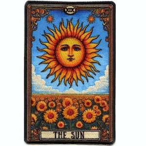 May include: The Sun tarot card depicts a bright yellow sun with a smiling face and blue eyes. The sun is surrounded by a field of sunflowers and a blue sky with white clouds. The card number, XIX, is in the top right corner. The text "THE SUN" is at the bottom of the card.