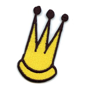 May include: Yellow embroidered crown patch with three points and a black outline.
