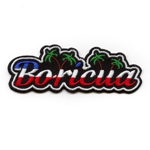 May include: Embroidered patch featuring the word "Boricua" in red and white lettering with a black outline. The word is surrounded by palm trees and a blue and white background.