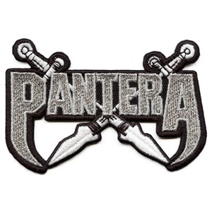 May include: A silver embroidered patch with the word "PANTERA" in a bold font, with two crossed swords behind the text.