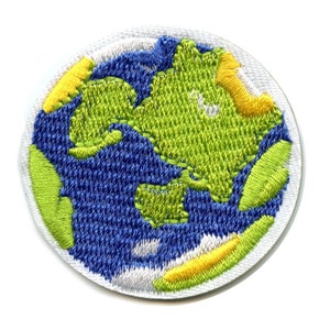 May include: Embroidered patch of a blue and green globe with yellow accents. The globe is stitched with white thread on a white background.
