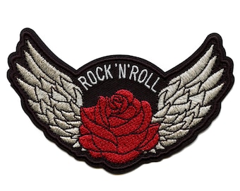May include: Black embroidered patch with a red rose and white wings. The text "Rock 'n' Roll" is written in a circle around the rose.