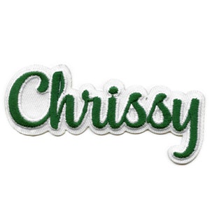 May include: Green embroidered iron-on patch with the name "Chrissy" in a cursive font.