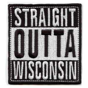 May include: Black and white embroidered patch with the text "STRAIGHT OUTTA WISCONSIN" in a white font on a black background.