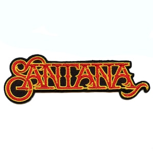 Pode incluir: Um remendo bordado com a palavra "Santana" em letras vermelhas e amarelas sobre um fundo preto.