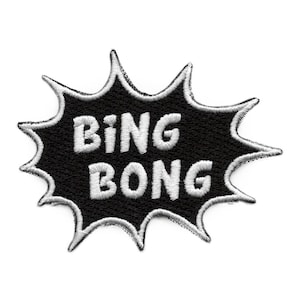 May include: Black and white embroidered patch with a white starburst shape and the words "Bing Bong" in white.