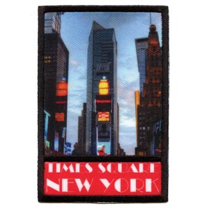 May include: A black and red embroidered patch with a photo of Times Square in New York City. The text "TIMES SQUARE NEW YORK" is printed in white on a red background.