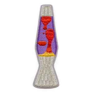 May include: A purple and silver embroidered patch of a lava lamp with a red and orange lava flow.