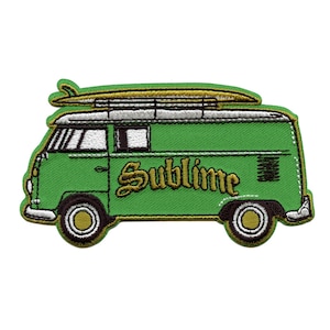 May include: Green Volkswagen van with a surfboard on the roof and the word "Sublime" written on the side in gold lettering.