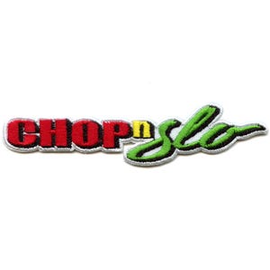 May include: Embroidered patch with the words "CHOP n Slo" in red, yellow, and green. The text is outlined in white and has a black border. The patch is on a white background.