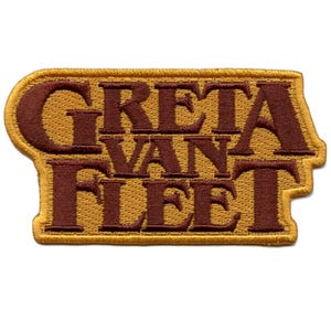May include: A brown and gold embroidered patch with the text "Greta Van Fleet" in a vintage style font.