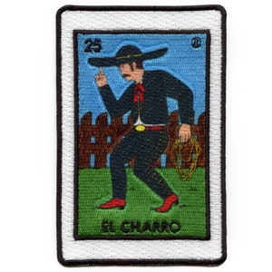 May include: A vintage-style embroidered patch featuring a cartoon charro, a Mexican cowboy, wearing a black hat and suit. The patch is surrounded by a white border and has the text "EL CHARRO" and the number "25" in the top left corner.