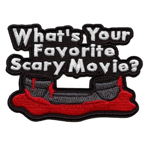 May include: Black embroidered patch with white text that reads "What's Your Favorite Scary Movie?" and a graphic of two bloody feet.