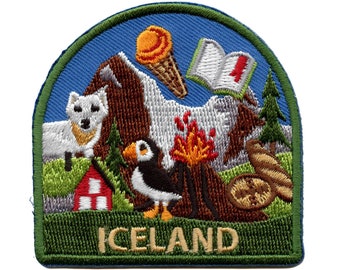 May include: Embroidered patch with a green border and the word "ICELAND" in white. The patch features a white polar bear, a red and white house, a puffin, a volcano with orange flames, a book with a red number one, and an ice cream cone.