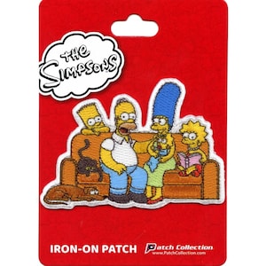 May include: Iron-on patch featuring the Simpsons family sitting on a couch. The patch is yellow, blue, and brown with white outlines. The text "The Simpsons" is in a white cloud above the family.