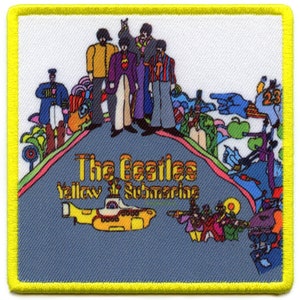 May include: A yellow submarine with the text "The Beatles Yellow Submarine" on a blue background. The Beatles are standing on a hill with a colorful landscape behind them.