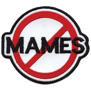 May include: A white embroidered patch with a red circle and a diagonal red line through it. The words "MAMES" are in black letters inside the circle.