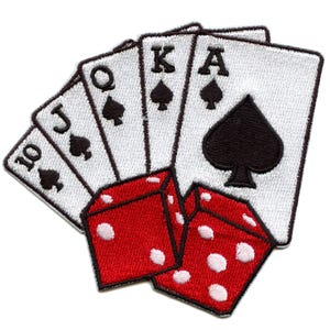 May include: An embroidered patch featuring a royal flush of spades playing cards and two red dice. The cards are arranged in a fan shape with the ace of spades at the top. The dice are stacked on top of each other.