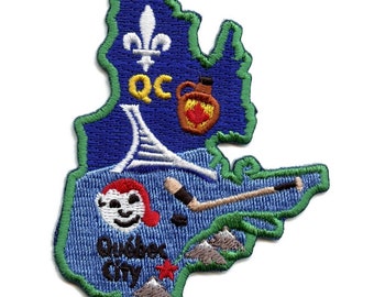 May include: Embroidered patch depicting a blue outline of Quebec City, Canada, with various icons including a fleur-de-lis, a maple leaf, a hockey stick, and the text "Quebec City".