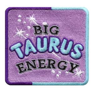 May include: Purple and blue embroidered patch with the text "BIG TAURUS ENERGY" in a white font with a starburst design.