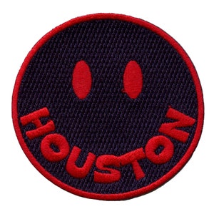 May include: Red embroidered smiley face patch with the word "HOUSTON" in a red arc around the bottom.