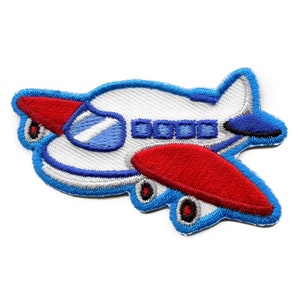 May include: A blue, red, and white embroidered airplane patch. The airplane is white with blue windows and red wings. The patch is outlined in blue.