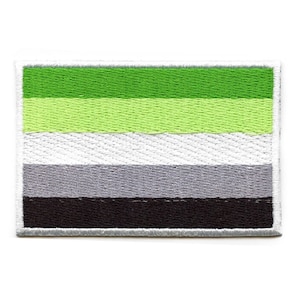 May include: Green, light green, white, gray, and black horizontal stripes on a white background. The flag is embroidered and has a white border.