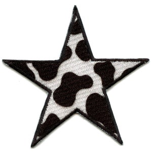 May include: A black and white cow print star-shaped patch. The star is outlined in black.