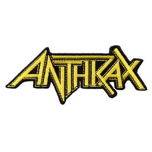 May include: Yellow embroidered patch with the word "ANTHRAX" in a stylized font.