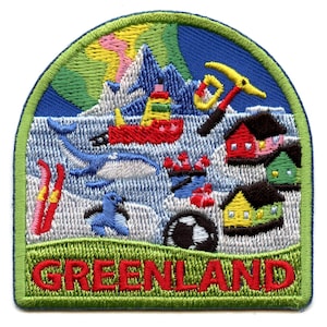 May include: Greenland embroidered patch with a colorful design featuring a red boat, blue whales, a green and yellow house, a red and white house, a black and white soccer ball, a red and yellow ski, a penguin, and a pickaxe. The text "GREENLAND" is embroidered in red on a green background.