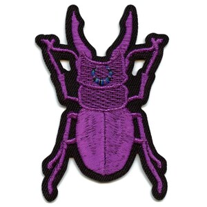 May include: Purple embroidered iron-on patch of a stag beetle with black outlines.