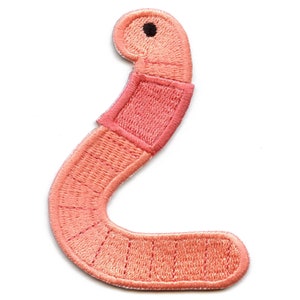 May include: A pink embroidered worm patch with a black eye. The worm is curled into a C shape.